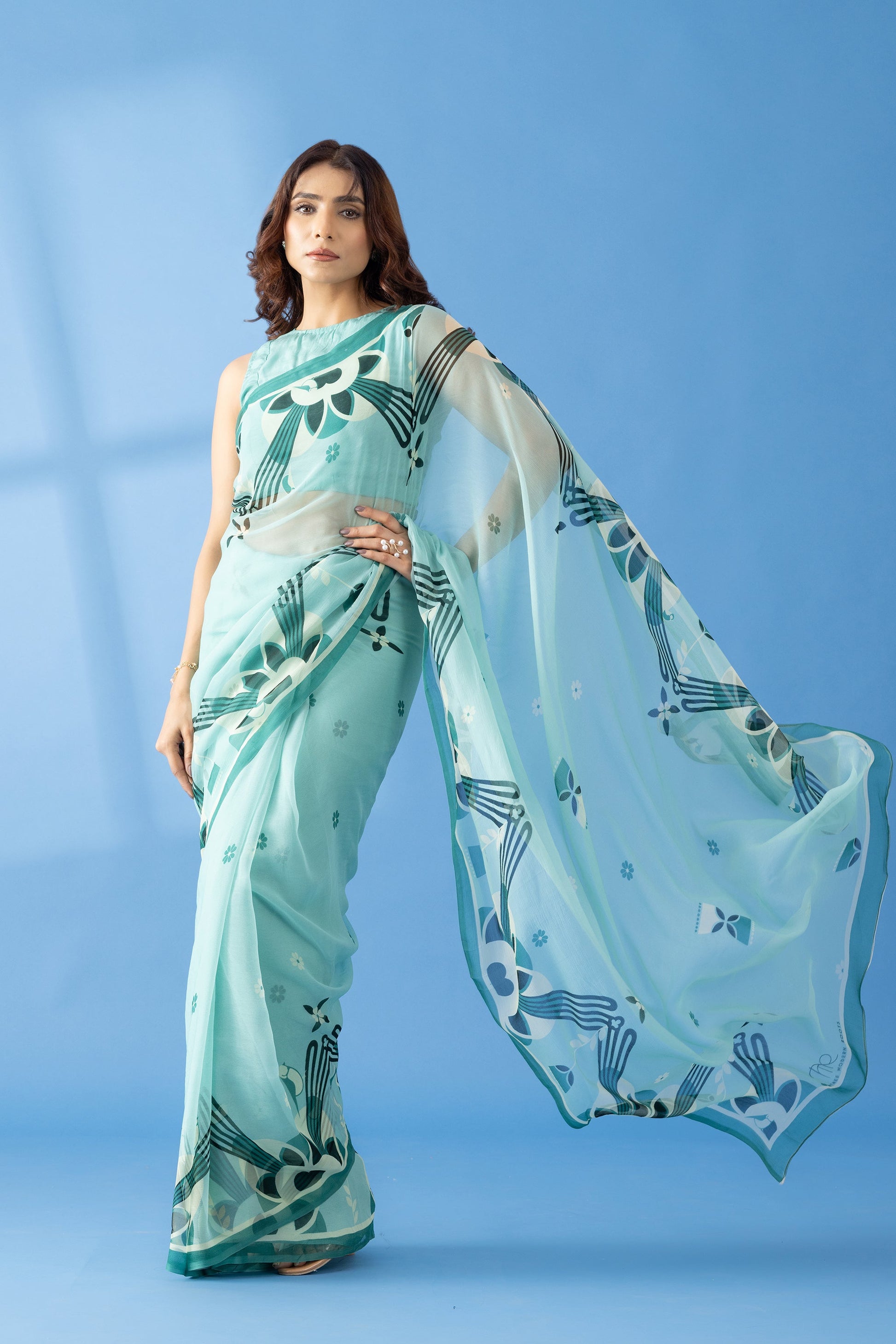 Majestic Peaks Sea Blue Printed Chiffon Saree