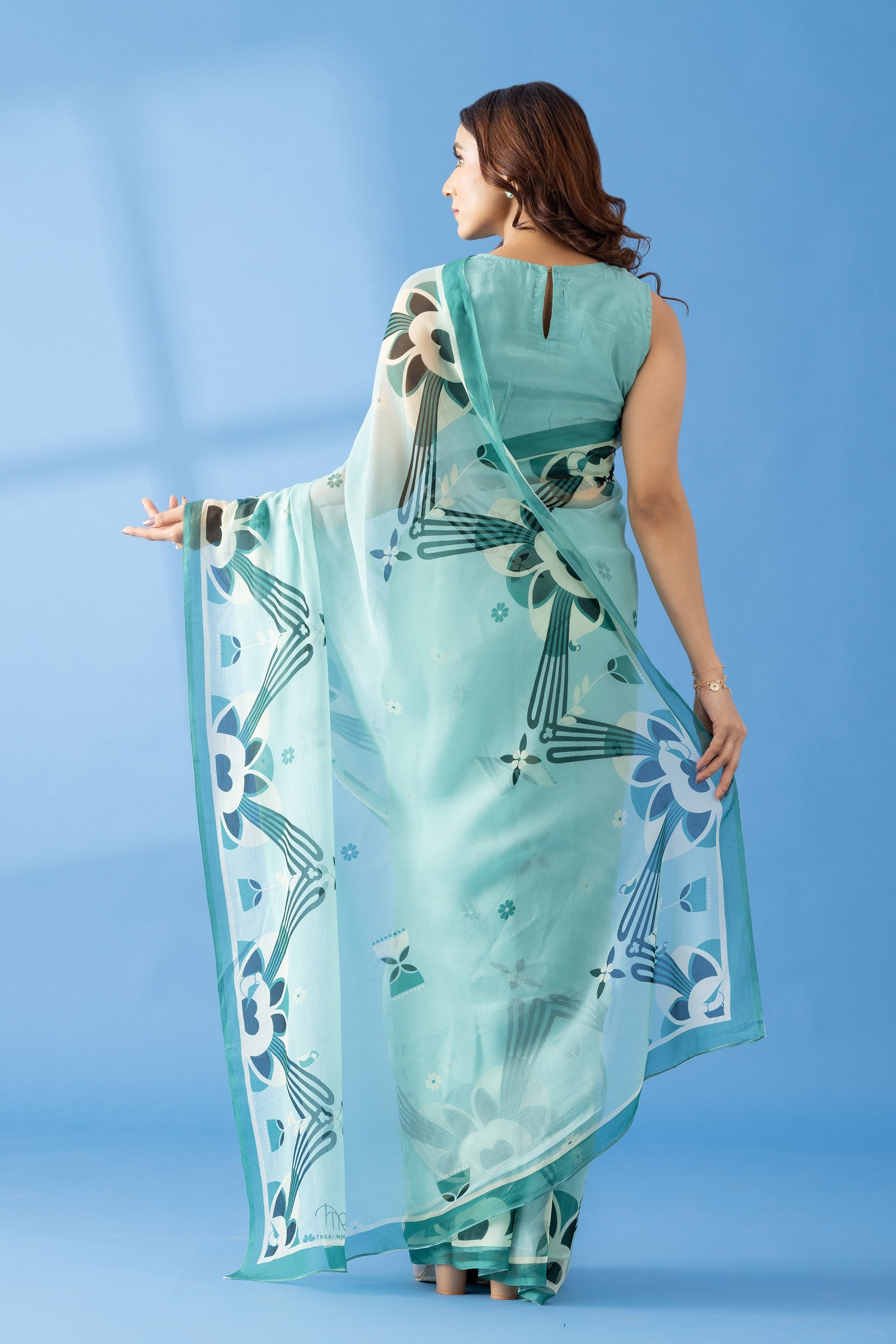 Majestic Peaks Sea Blue Printed Chiffon Saree