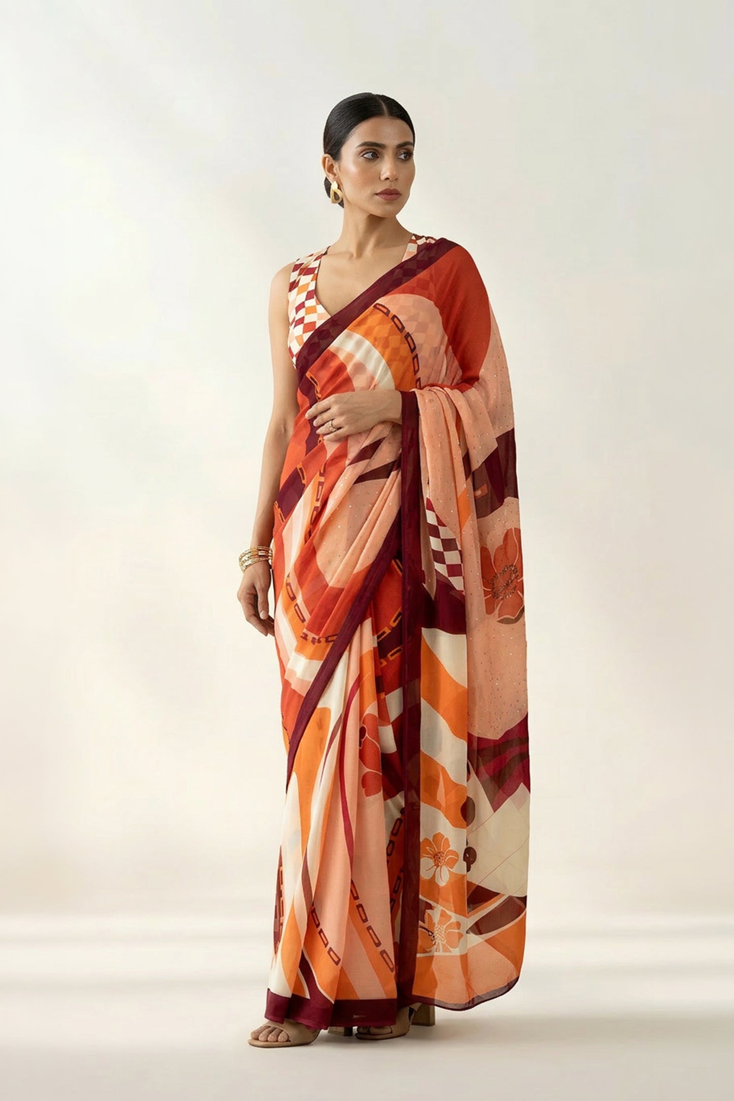 Whimsical Swirls Rust Printed & Embroidered Georgette Saree