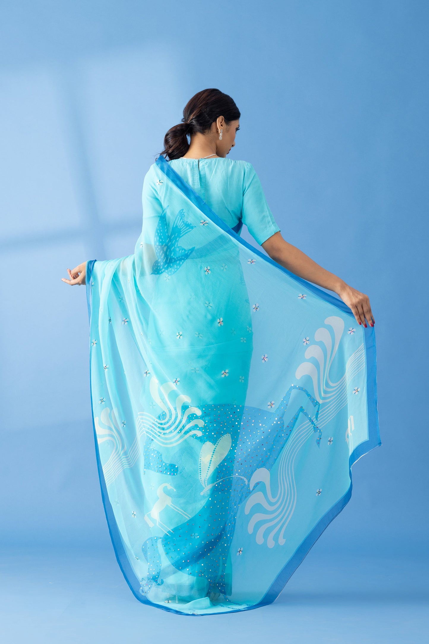 Graceful Charms Light Blue Printed & Embroidered Chiffon Saree