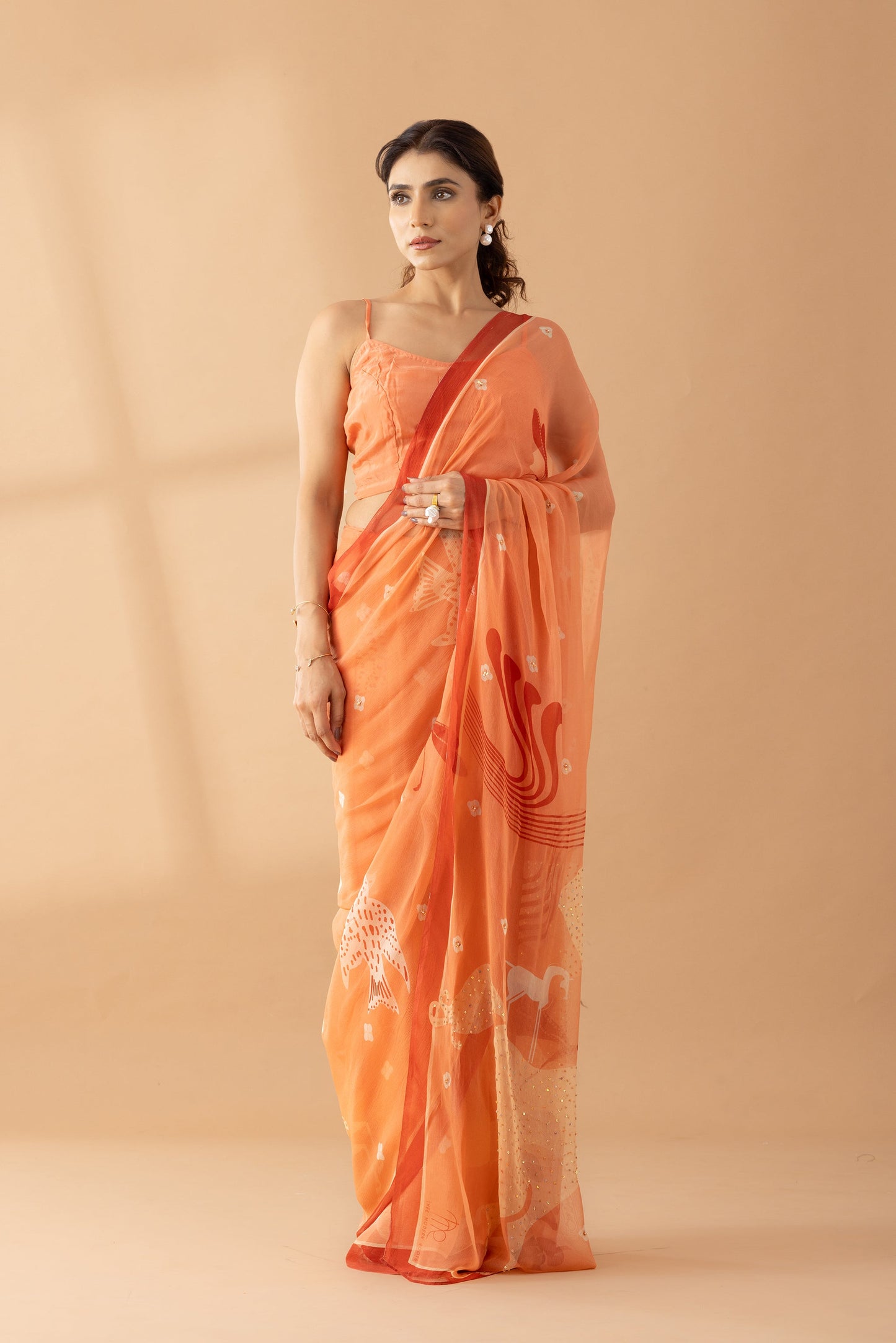 Graceful Charms Peach Fuzz Printed & Embroidered Chiffon Saree