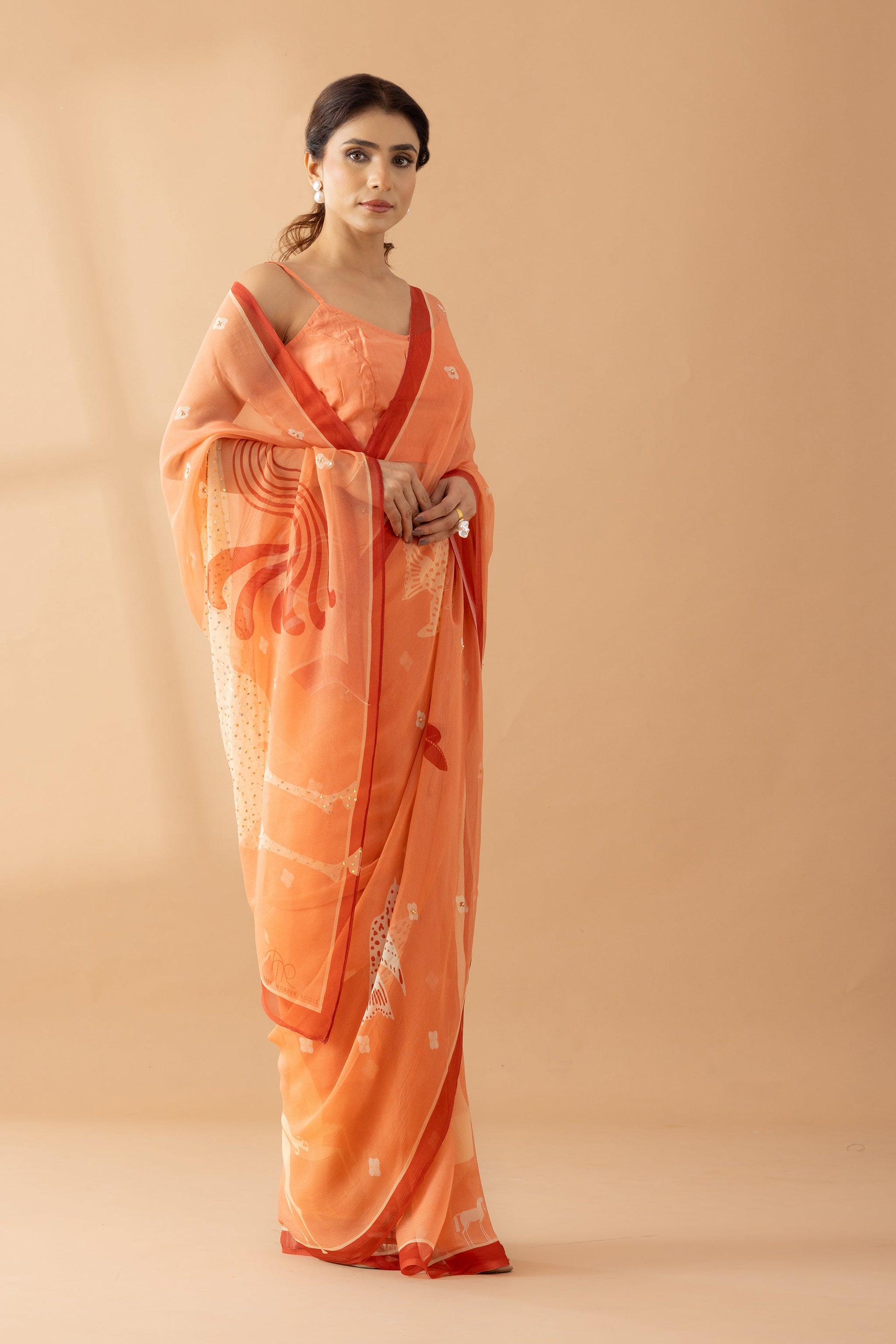 Graceful Charms Peach Fuzz Printed & Embroidered Chiffon Saree