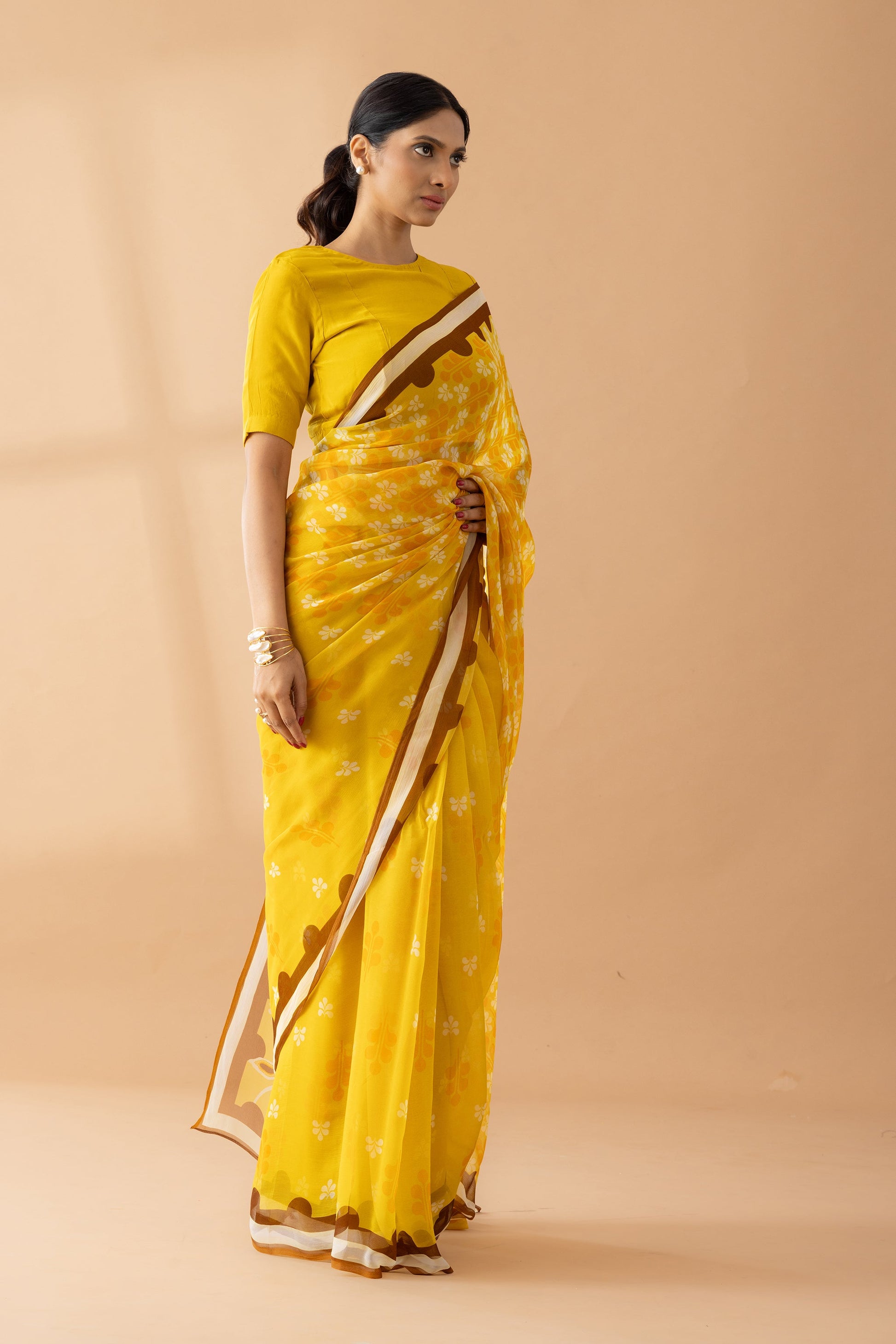 Yellow Petal Shower Printed Chiffon Saree