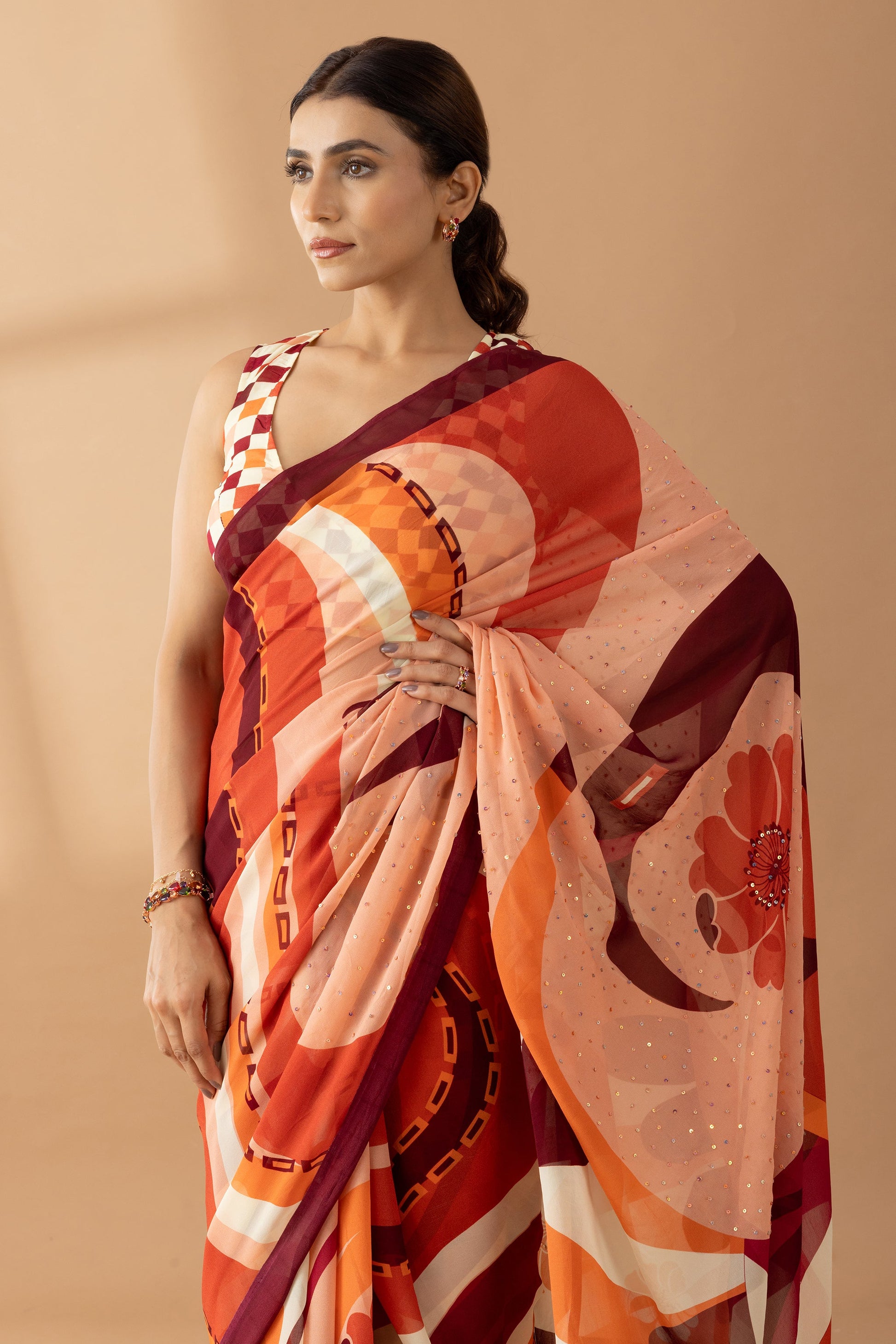 Whimsical Swirls Rust Printed & Embroidered Georgette Saree