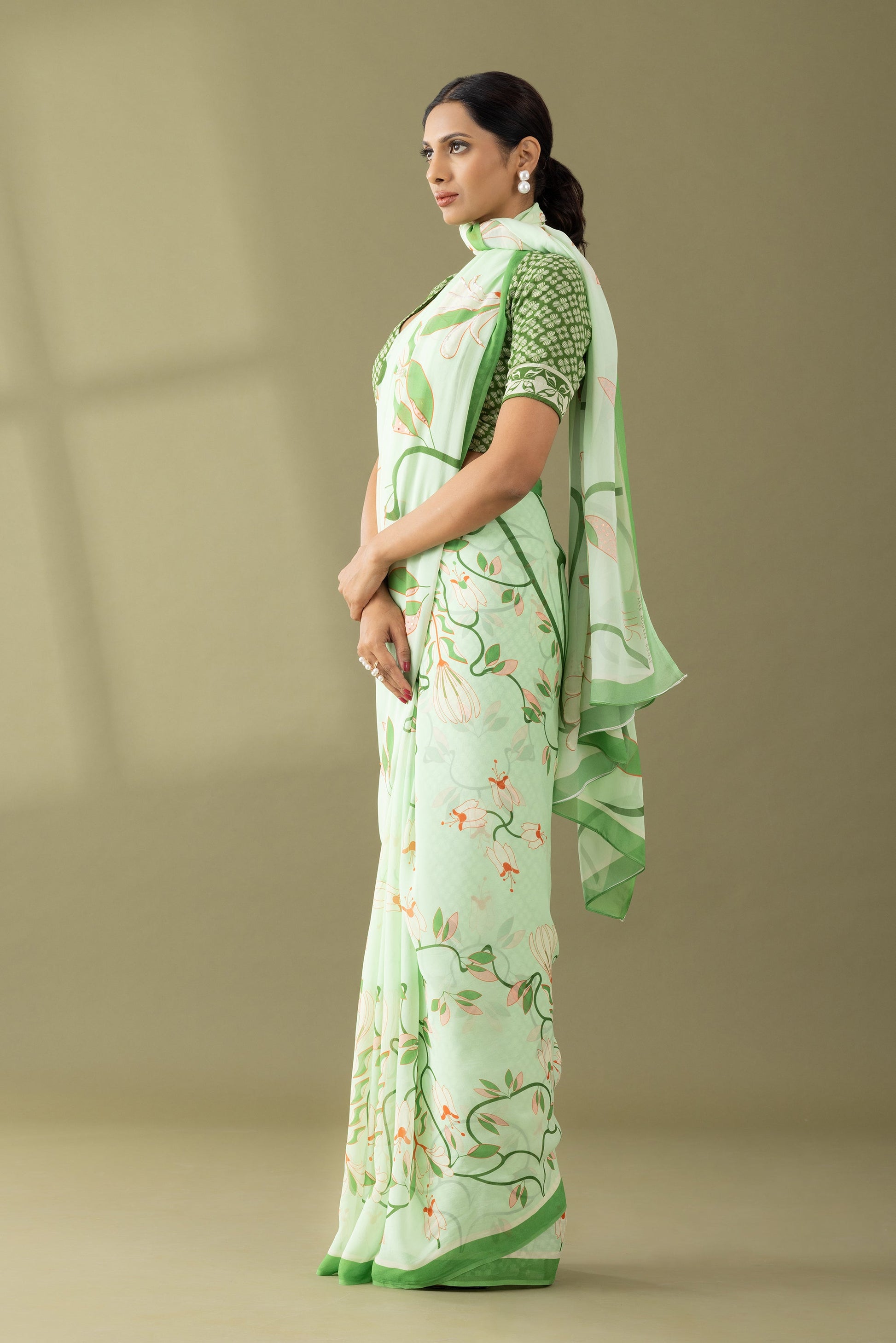 Timeless Garden Pastel Green Printed & Embroidered Georgette Saree